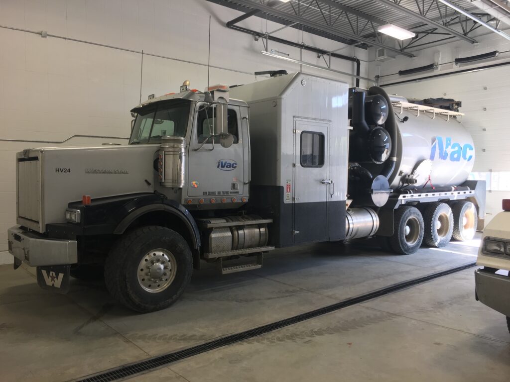 trailer truck inside a service station
